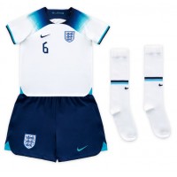Camiseta Inglaterra Harry Maguire #6 Primera Equipación para niños Mundial 2022 manga corta (+ pantalones cortos)